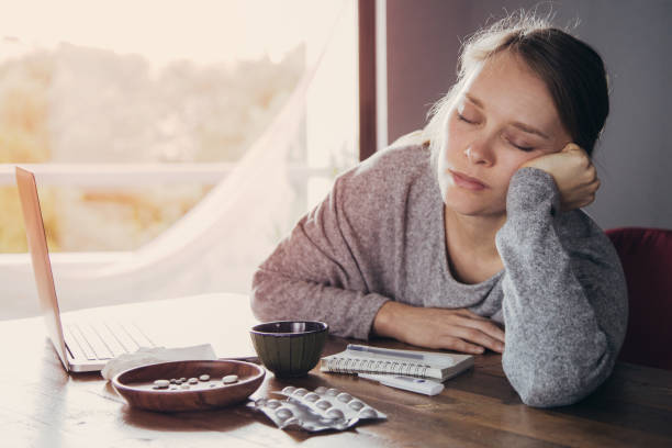 istock Tired sick woman with closed eyes relaxing after working on PC 1141946780