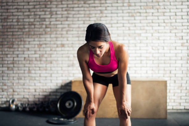 istock Latin woman tired from working out 1141947906