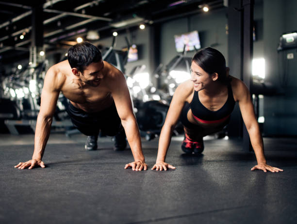 istock A latin couple working out in a gym together 1141947981