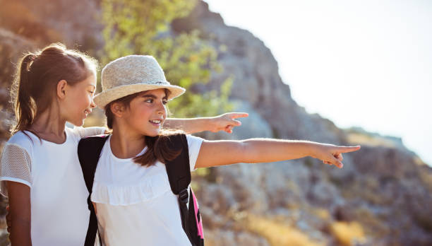 istock Two happy little girls enjoying excursion 1141948385