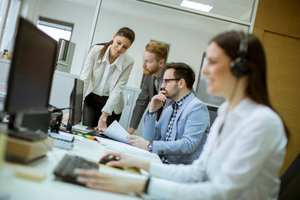 istock People working in a busy office 1141948405