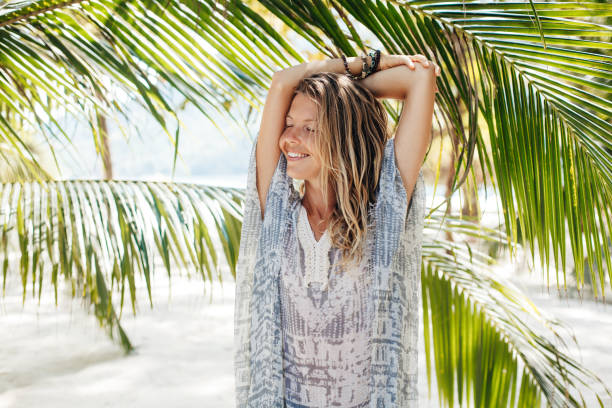 istock Dreamy girl on beach 1141949130
