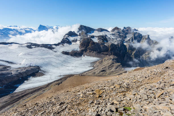 istock Engelberger Rotstock mountain summit, Bluemlisalpfirn, blue sky 1141950590