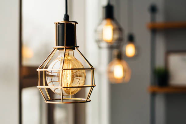 istock Glowing light bulbs in the loft style 1141952158