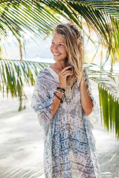 istock Dreamy girl on beach 1141952175