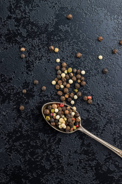 istock Different types of dried peppercorn. 1141953401