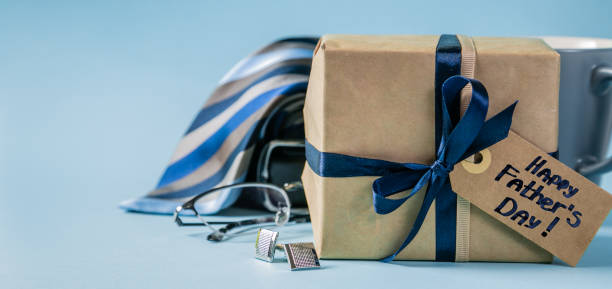 istock Fathers day concept - present, coffee, tie, mustache 1141955459