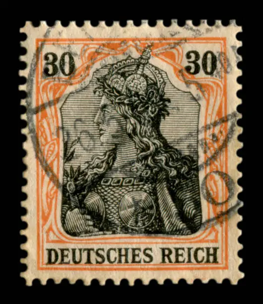 German empire - 26 May 1909: German historical stamp: the portrait of the Valkyrie from the epic of the Nibelungs with black ink cancellation, Germany