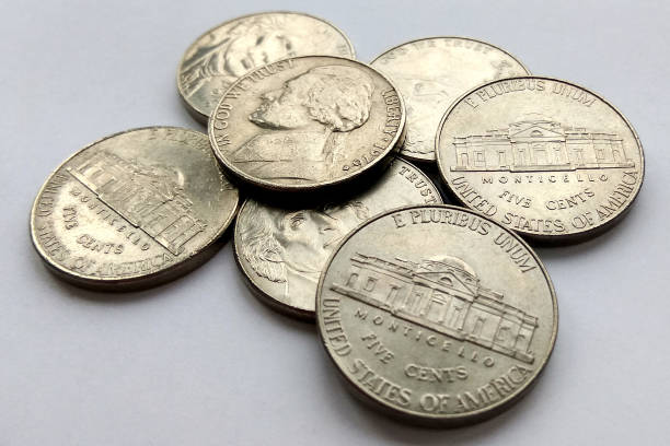 American 5 cent coins usa on white background