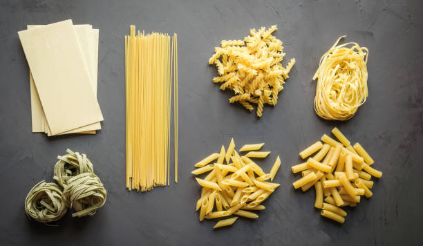 istock Different types of pasta from durum wheat varieties for cooking Mediterranean dishes. 1141962497