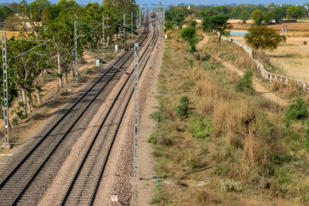 istock Traction power line rail corridor. Railroad tracks 1141964286