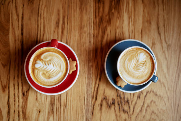 istock Top view of two cups filled with fresh espresso on table in cafeteria. 1141971194