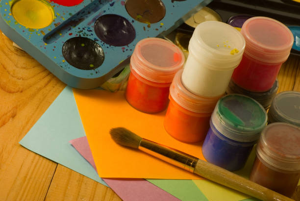 istock image of water colors and brush on the table 1141974582