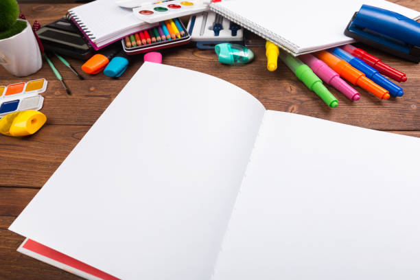 istock Desk cluttered with office supplies 1141978243