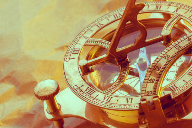 istock antique compass on vintage paper background 1141980572