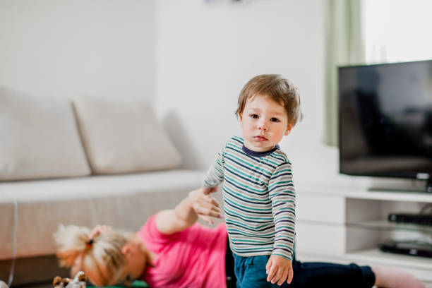 istock Mother and son having fun at home 1141980715