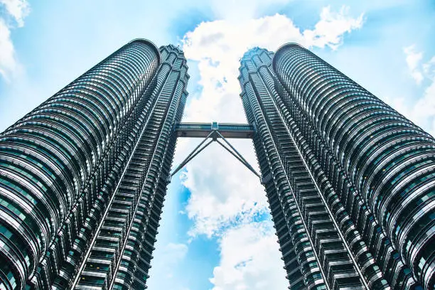 KUALA-LUMPUR, MALAYSIA - FEBRUARY 28. Petronas Towers in Kuala Lumpur. Skyscraper. Close-up.