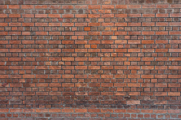 istock red brick wall texture grunge background. modern style background, industrial architecture detail display and montage of product. Interior design concept, background texture with copy spaces. 1141981677