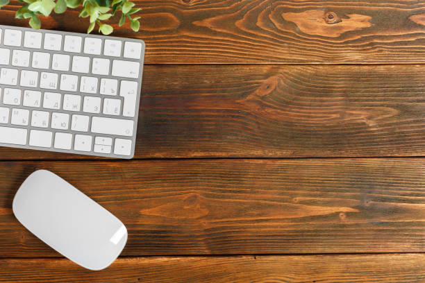 istock Modern working business desk with keyboard, mouse 1141982532