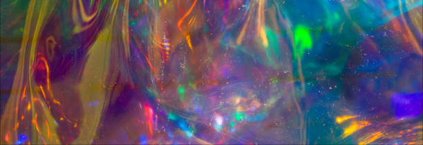 istock multicolored  holographic iridescent surface wrinkled foil 1141982720
