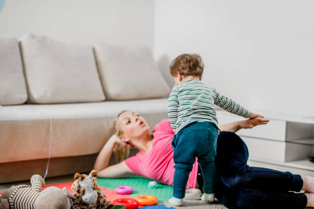 istock Mother and son having fun at home 1141983825