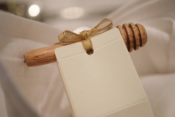 istock Honey in packets with wooden stick, cute souvenirs wedding 1141987685