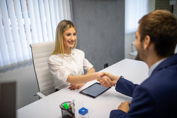 istock Businesspeople handshaking after negotiation 1141990063