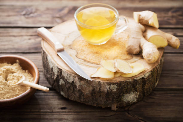 istock ginger tea on old wooden background 1141991081