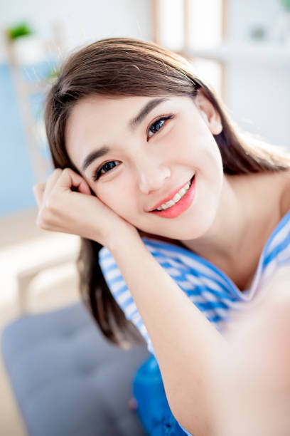 istock beauty woman take a selfie 1141991858