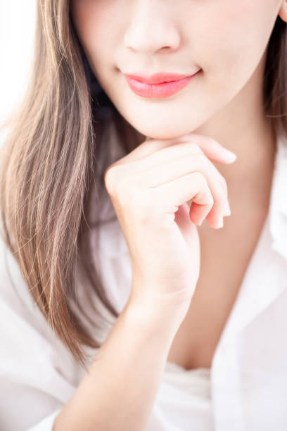 istock close up woman lip 1141992671