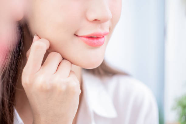 istock close up woman lip 1141994588