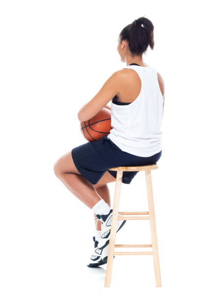 istock African American basketball player on white background - sitting 1141995974