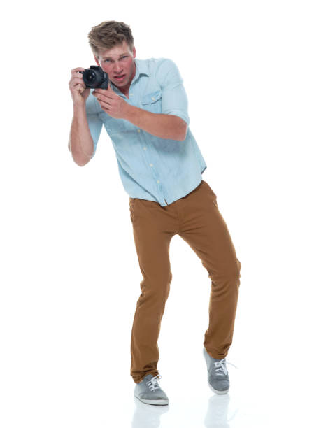 istock Handsome male photographer 1141995983