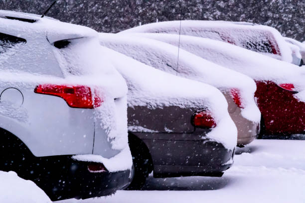 istock Cars park in Heavy Snow fall. 1141996324