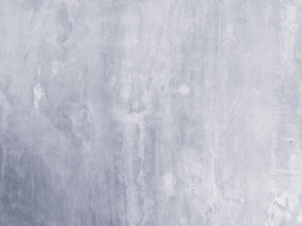 istock gray concrete background texture clean stucco fine grain cement wall clear and smooth white polished grunge interior indoor. 1141997517