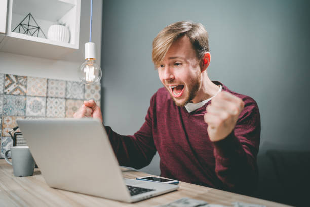 istock Male gambler celebrating victory 1141997546