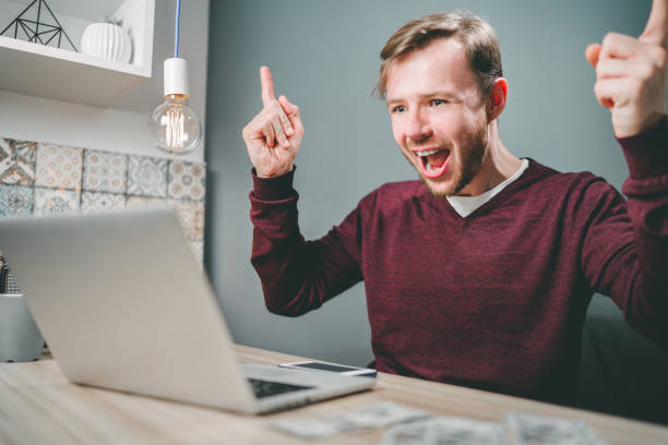 istock Male gambler celebrating victory 1141997624