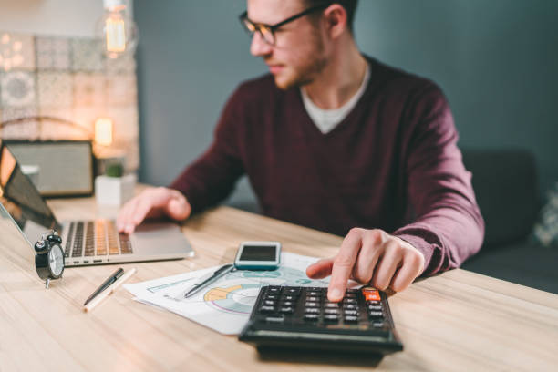 istock Male accountant working home 1141997706