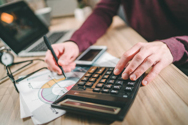 istock Male accountant working home 1141997866