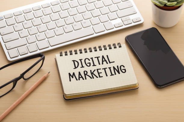 istock Digital marketing concept with smartphone on office desk 1141999376