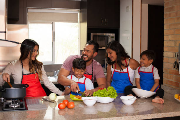 istock family cooking 1141999650