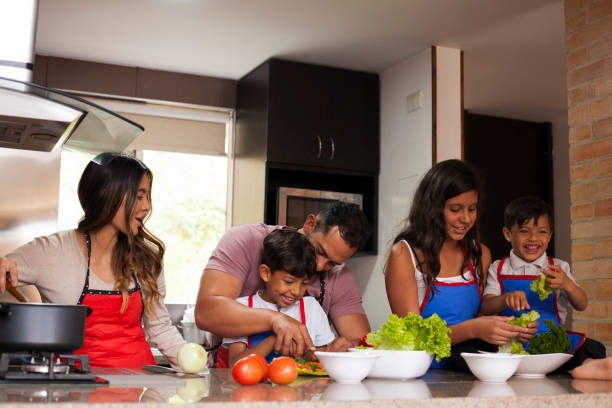 istock family cooking 1141999713