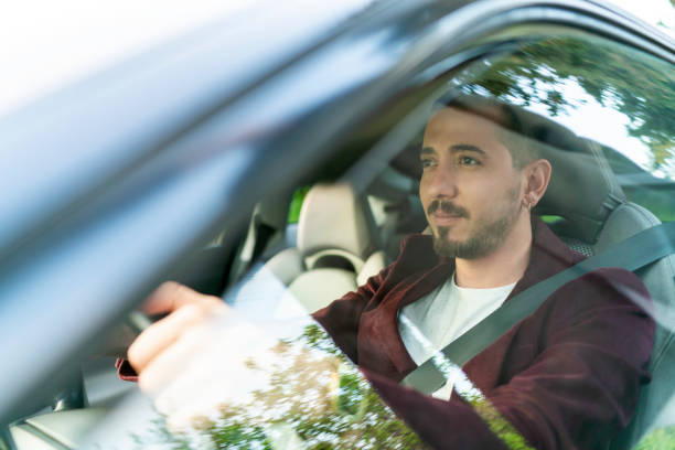 istock Businessman driving a car 1142000790
