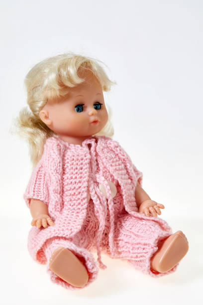 istock Vintage puppet,  blond curly hair, on white background 1142002538