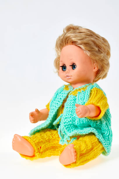 istock Vintage puppet,  blond curly hair, on white background 1142003367