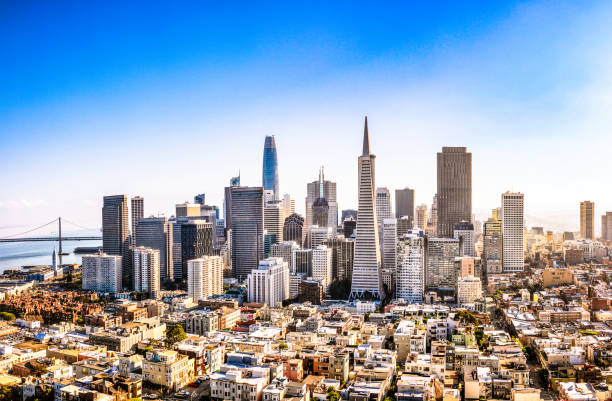 Downtown San Francisco A high angle view of San Francisco's business district on a sunny day. san francisco california stock pictures, royalty-free photos & images