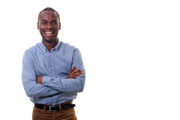 istock happy young businessman smiling against isolated white background 1142003934