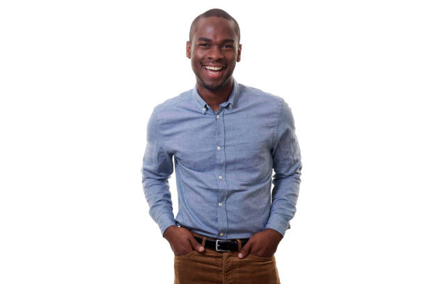 istock handsome young african american man smiling by white background 1142003935