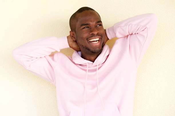 istock carefree african american man laughing with hands behind head 1142004030