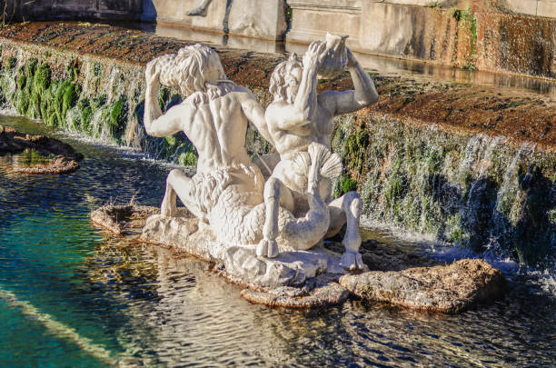 istock a beautiful fountain with statues and rocks 1142004243